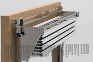 CUBE stacking door with aluminium sections folding compactly behind the opening for use in limited depth industrial installations.